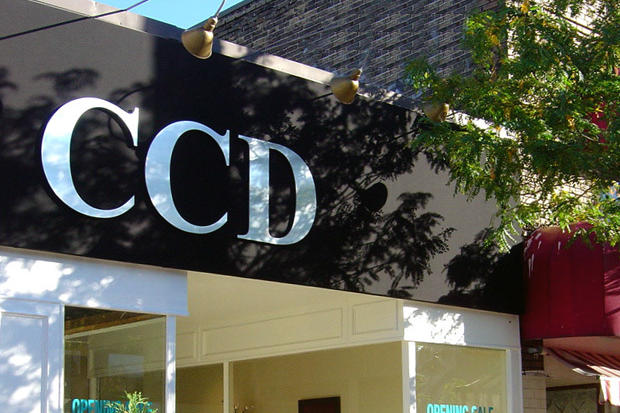 3d retail sign made of exterior canvas, and dimensional laser cutout acrylic letters with brushed stainless steel finish