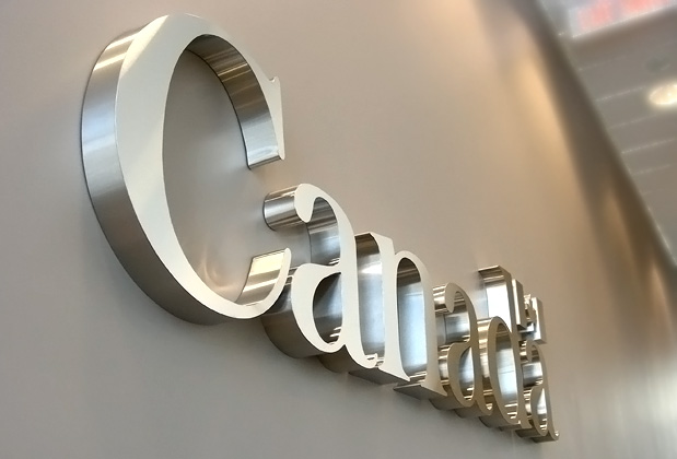 art signs office signage 3d metal sign installed in corporate office of Health agency Canada